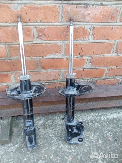 Стойки передние митсубиси кольт плюс