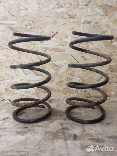 Пружина амортизатор передний Mazda 323 BJ 2001г