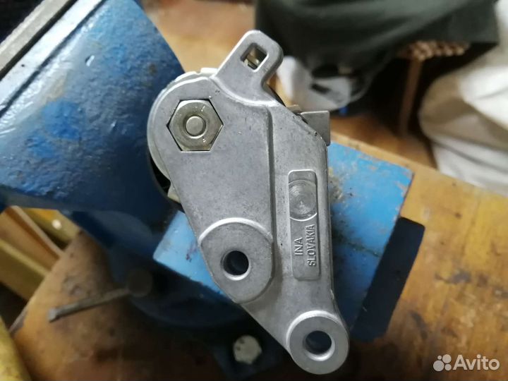 Натяжной ролик ремня грм на форд фокус 1