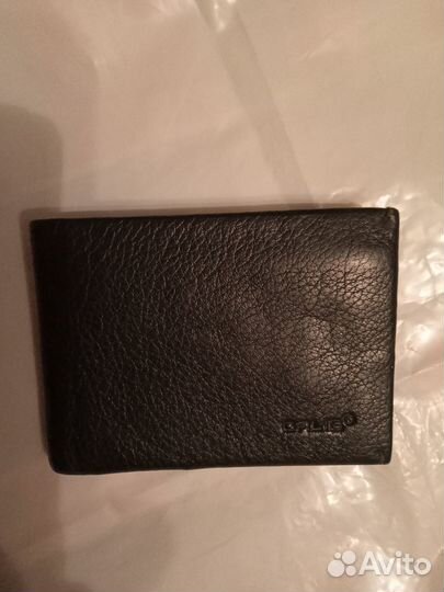 Женские кошельки из кожи и косметички