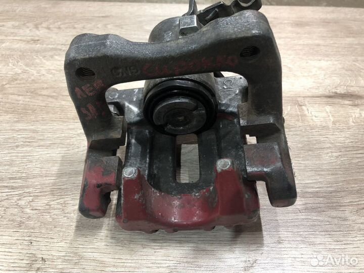 Суппорт задний левый Volkswagen