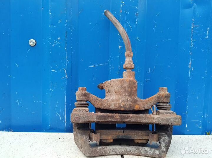 Суппорт задний левый Mitsubishi Galant 8 2.0 4G63