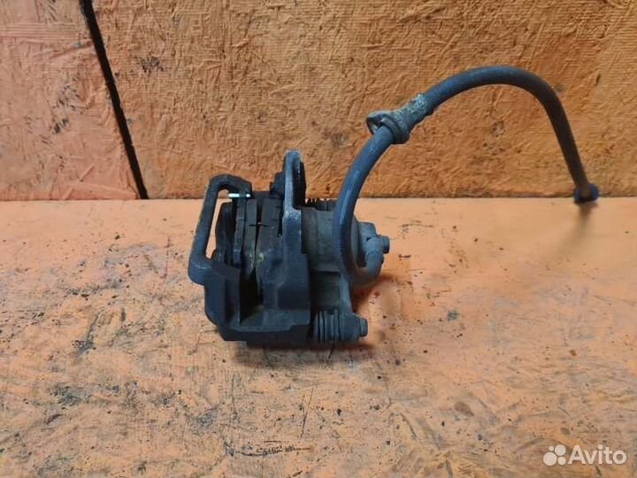 Суппорт тормозной задний левый Acura Mdx YD3 3.5