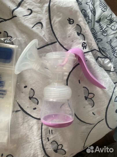Молокоотсос и пакеты для грудного молока