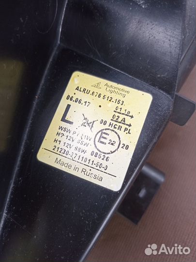 Блок фара Niva Chevrolet левая с чёрным безелем