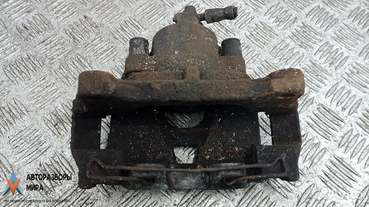 Суппорт передний правый Volkswagen Tiguan 2009