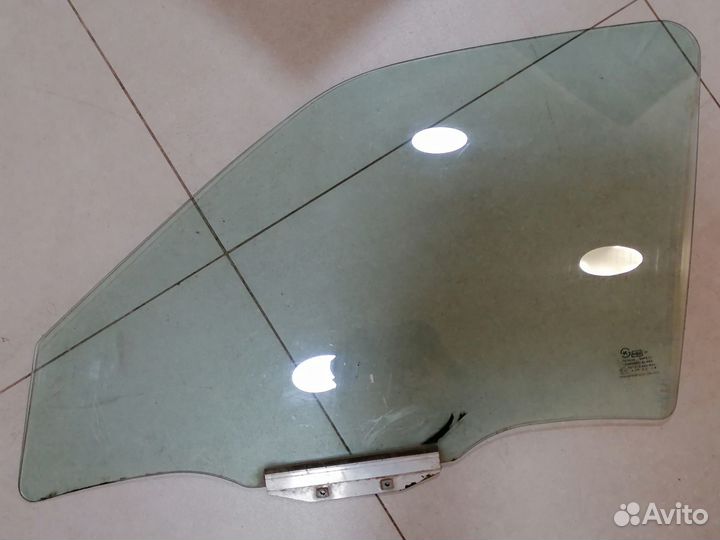 Стекло передней левой двери Daewoo Nexia