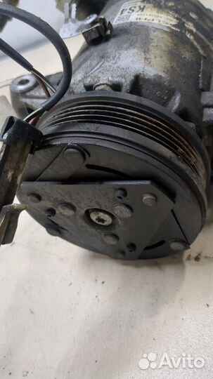 Компрессор кондиционера Opel Zafira B