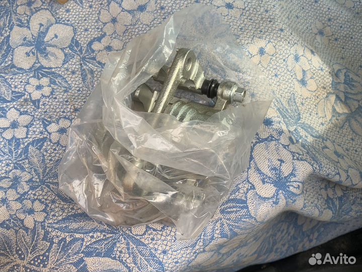 Суппорт тормозной задний левый