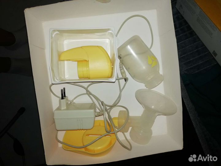 Молокоотсос medela электрический