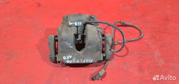 Мерседес Е-класс суппорт передний левый W 210