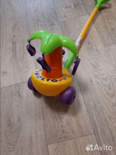 Игрушка каталка с ручкой