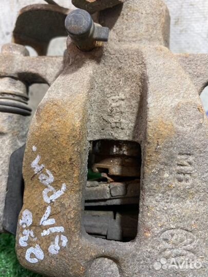 Суппорт задний левый Kia Rio 3 седан 1.6 G4FC 2011