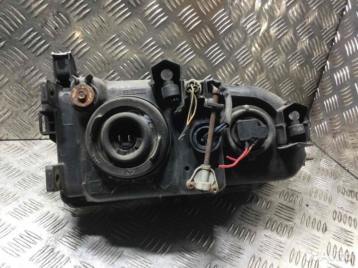 Фара левая Mitsubishi Space Gear 11087245 4G63