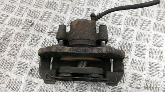 Суппорт тормозной передний правый mazda 3 1 (89G16