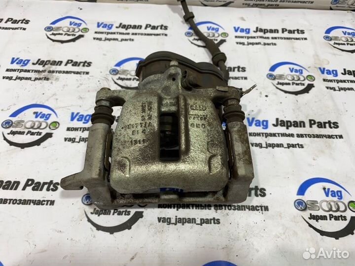 Суппорт тормозной задний левый Audi A6 C7 chva