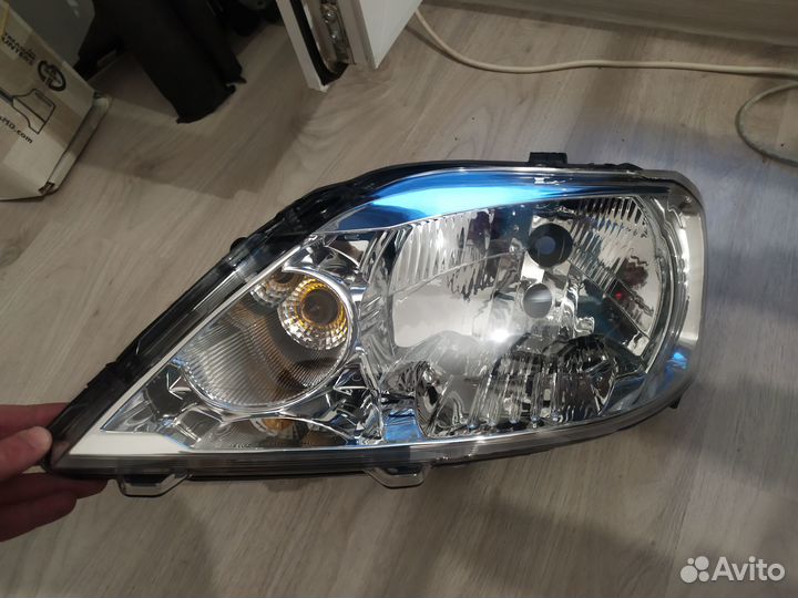 Фара renault logan