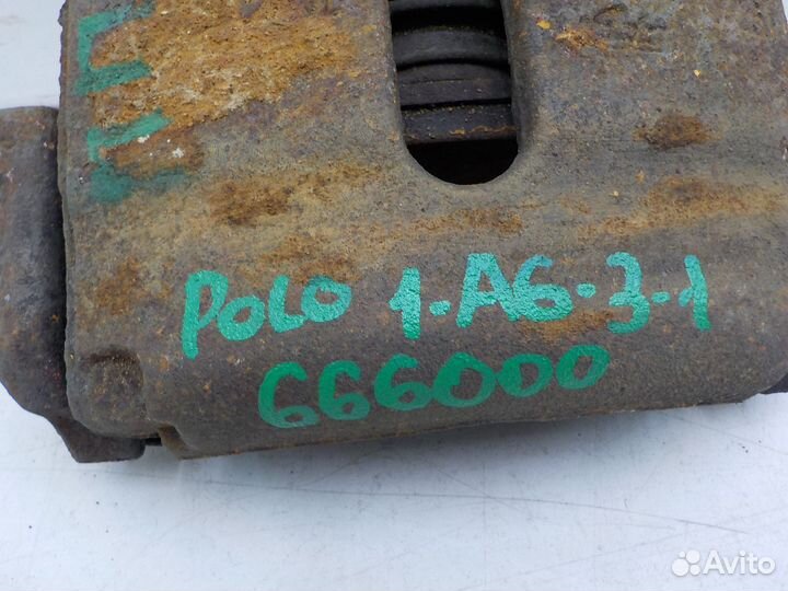 Суппорт тормозной передний левый Volkswagen Polo