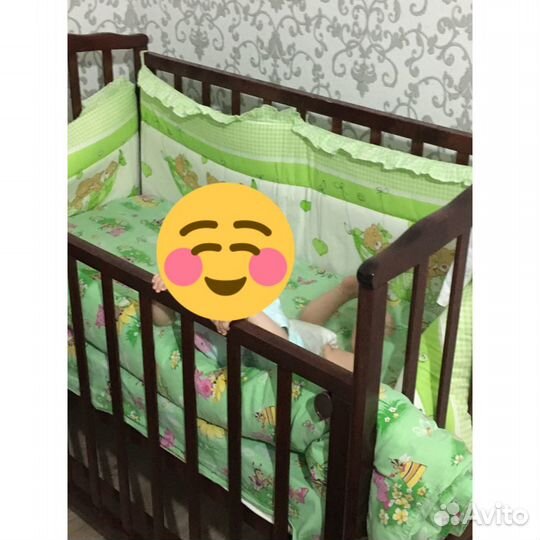 Детская кроватка с продольным маятником