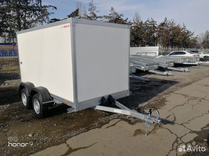 Двухосный промтоварный фургон прицеп 817783.001