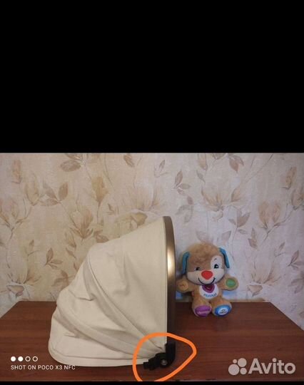 Крепление капора (капюшона) коляски aulon