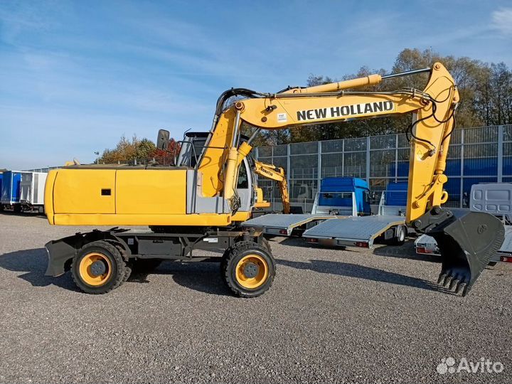 Колёсный экскаватор New Holland EW220, 2012