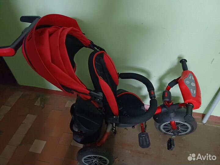 Трехколесный велосипед с ручкой