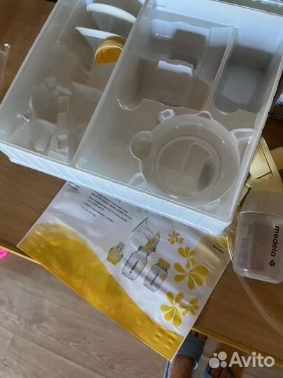 Молокоотсос medela swing maxi flex