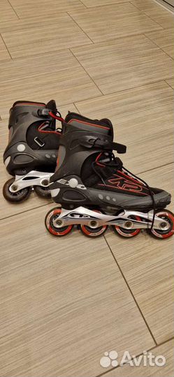 Роликовые коньки