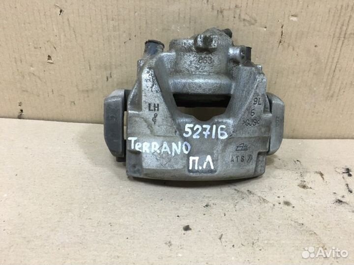 Суппорт тормозной передний левый Nissan Terrano 3