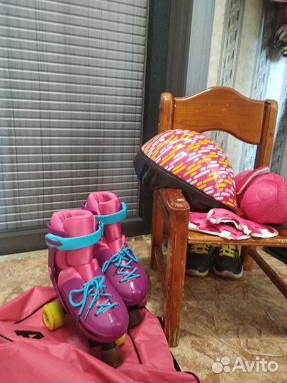 Роликовые коньки