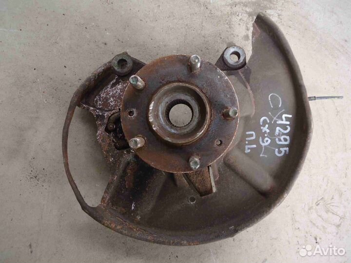 Кулак поворотный левый Mazda CX-9 1 TB