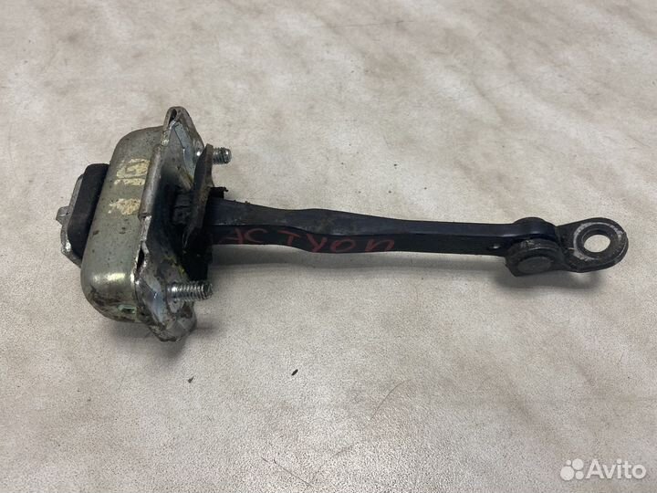 Ограничитель задней левой двери actyon sport