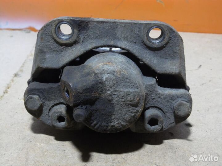 Суппорт тормозной передний левый Рено Логан