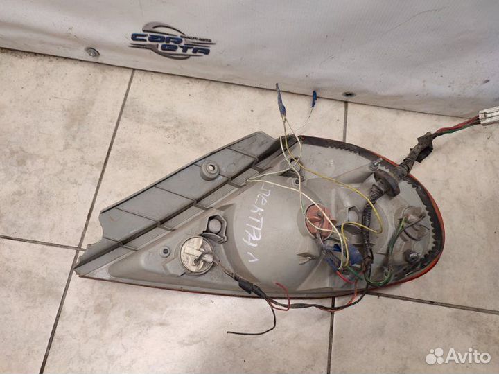 Фонарь задний задний левый Kia Spectra 1.6 S6D