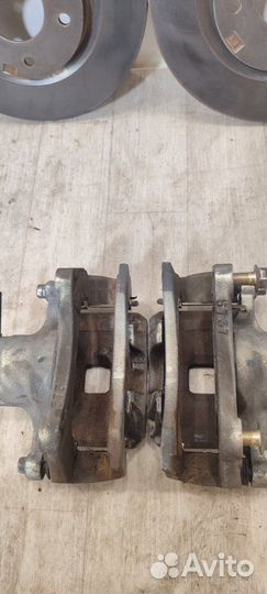 Суппорта и диски передняя Mitsubishi Lancer 10