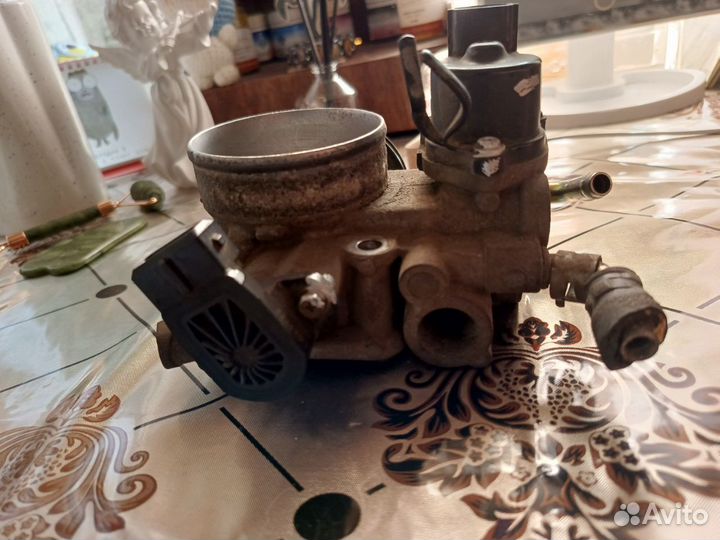 Дроссельная заслонка lancer 9