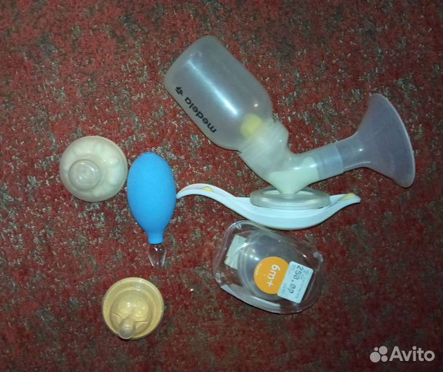 Молокоотсос medela ручной