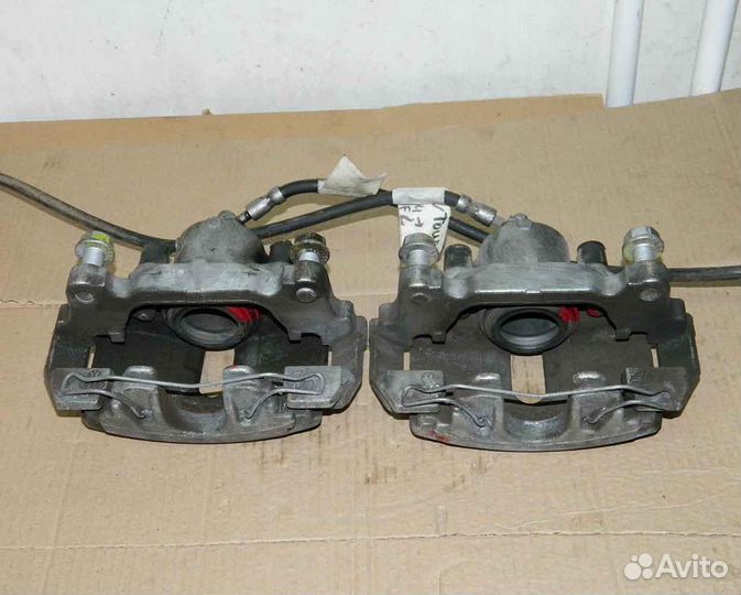 Суппорт передний левый/правый VW Touran