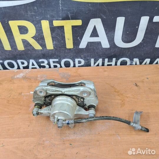 Суппорт тормозной передний левый Kia Cerato 4