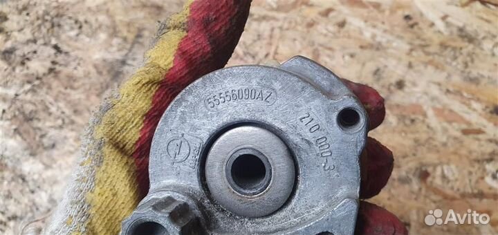 Ролик-натяжитель ручейкового ремня Opel Astra H 2