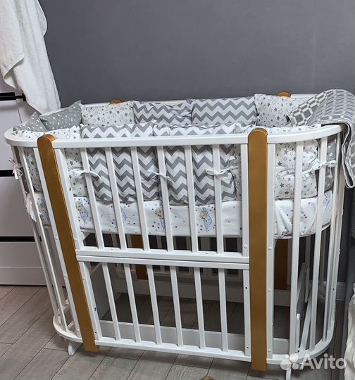 Детская кроватка с поперечным маятником