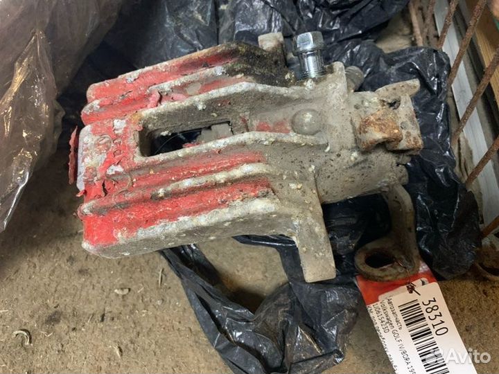 Суппорт тормозной задний левый Volkswagen Golf