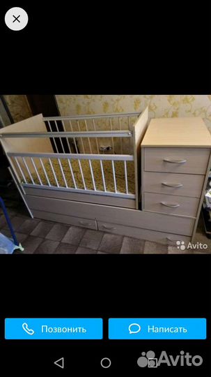 Детская кроватка с маятником