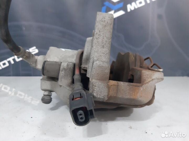 Суппорт передний левый Volkswagen Passat Variant