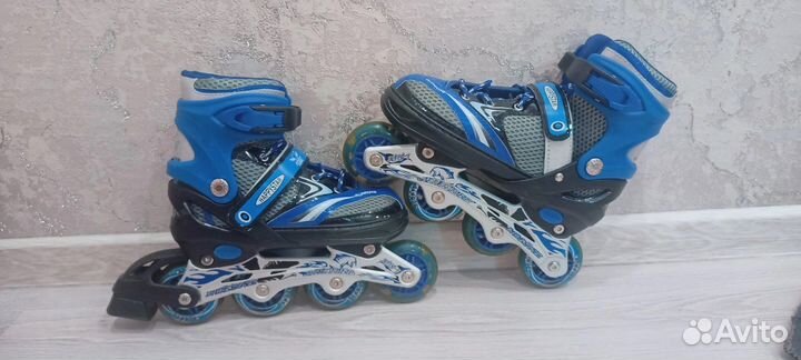 Роликовые коньки