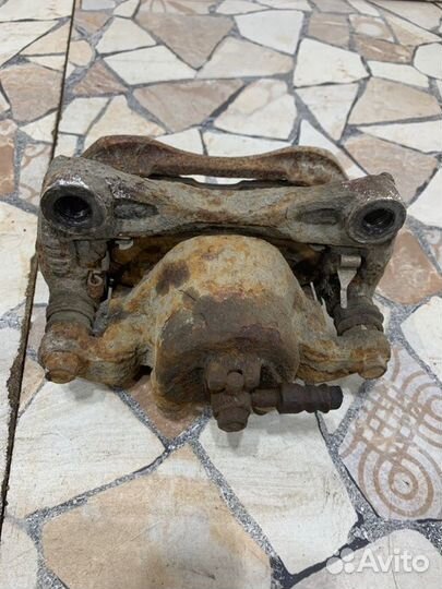 Суппорт тормозной Nissan Teana J32