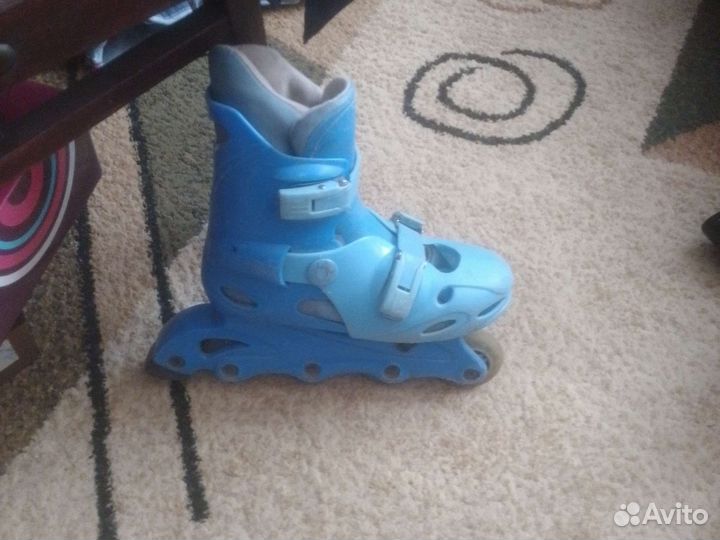 Роликовые коньки