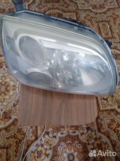 Продам фару на Мицубиси левая б/у