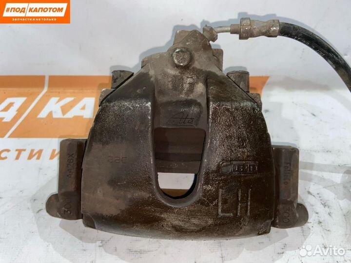 Суппорт тормозной передний левый Ford Focus 3 2011